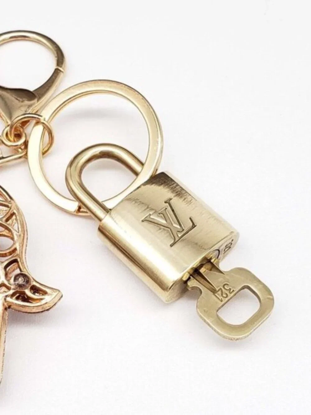 Louis Vuitton Gold Lock 🔑 Authentic LV Padlock + Bag Unbranded Evil Eye Charm